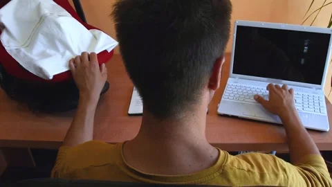New dad works from home while caring for son Stock Footage 140287164