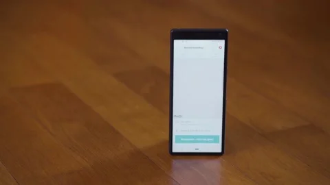 New Deliveroo order notification pops up on smartphone of delivery courier Stock Footage 170582424