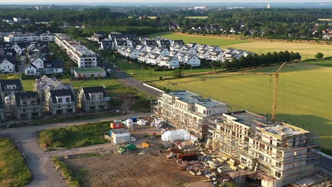 New Development Area with Detached Houses and the Shell of Apartment Building. Vídeo Stock 274428630