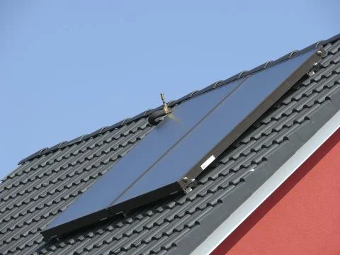 New development area solar system on tiled roof Fotos de archivo