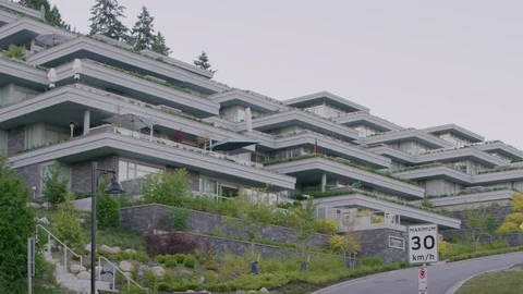 New development on hillside pan at dusk Stock Footage 103399799