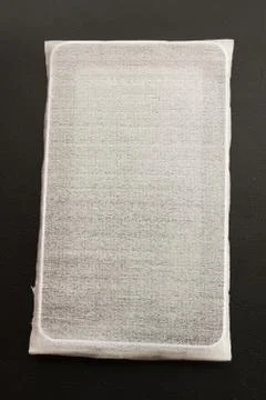 New digital tablet, packaged and wrapped in protective pouch Fotos Stock