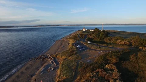 New Dungeness Lighthouse Cape Point Beach Water Sunset, Washington Stock Footage 101623526