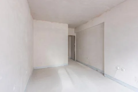 New empty room under construction. Plaster walls. New home. Concrete walls. I Stock-Fotos