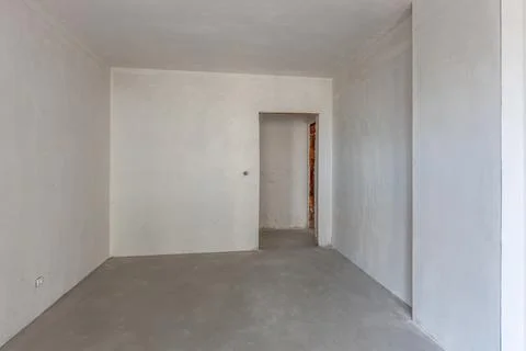 New empty room under construction. Plaster walls. New home. Concrete walls. I Foto stock