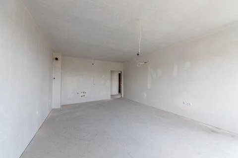 New empty room under construction. Plaster walls. New home. Concrete walls... 写真素材