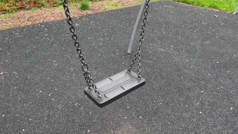 New Empty swing in a park Stock Footage 239629652