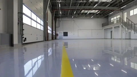 New epoxy floor with colored markings in a car workshop. Stock Footage 143149239