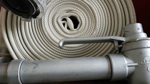 New fire hose close-up including aluminium piping and valves. Stock Footage 97717783