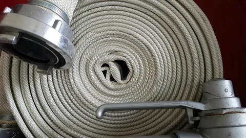 New fire hose close-up including aluminium piping and valves. Stock Footage 97721524