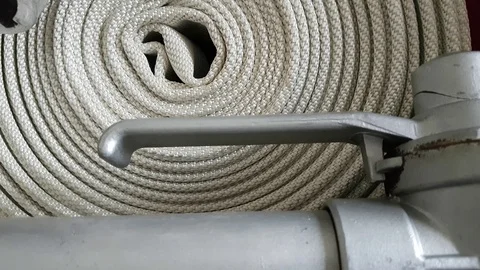 New fire hose close-up including aluminium piping and valves. Stock Footage 97721614