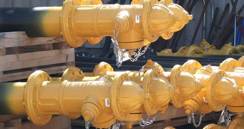 New Fire Hydrants - Stacked - Bright Yellow Stock Footage 88604142