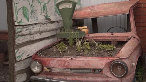 New function for an old car. It is staying on a  farm and serve as a Video stock 108109545