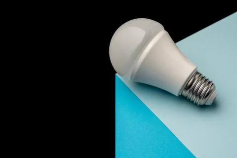 A new generation light bulb on a three-dimensional cube, conceptual ideas. Stock Photos