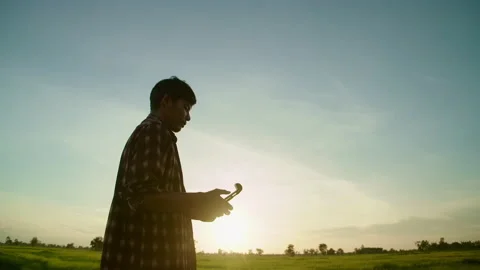 New generation of smart farmer working on the farm. Video stock 158745192