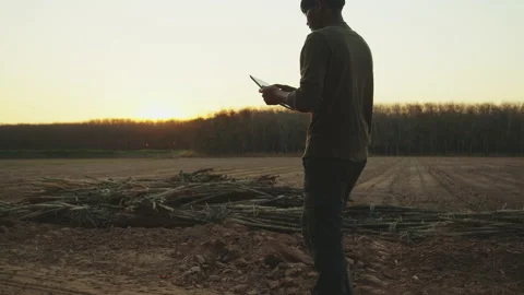 New generation of smart farmer working on the farm. Видео 173441605