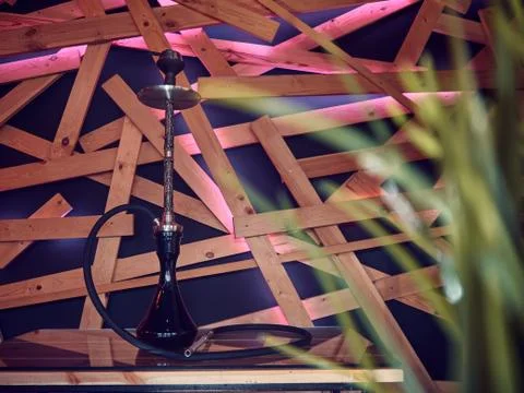 New Glass Hookah with beautiful backlight in the cafe 스톡 사진