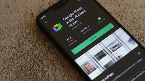 New Google Meets application renamed on the smartphone screen. Stock Footage 147351203