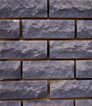 New gray brick wall. texture, pattern. close-up. Stock Photos