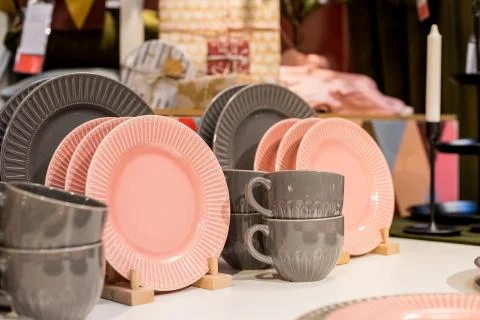 New gray, pink table setting . modern style. Serving for store catalog. Hot Stock Photos