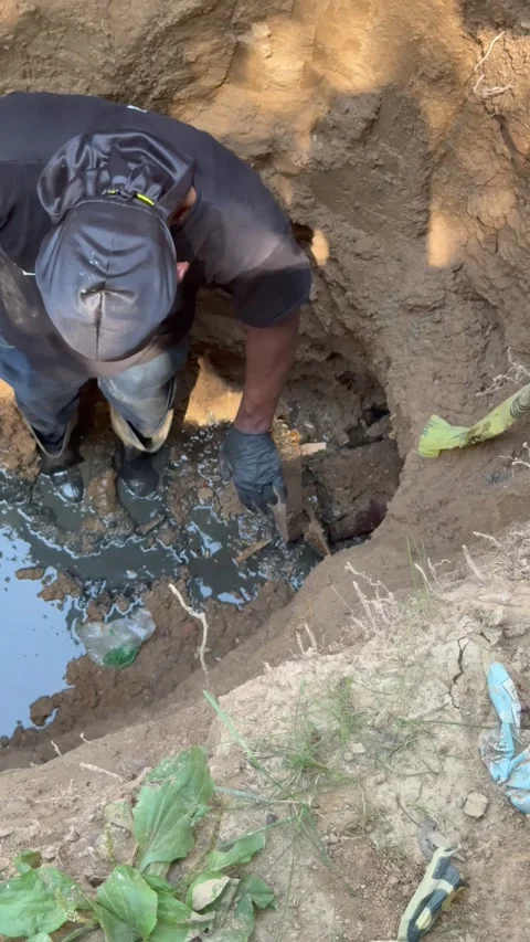 New Guy Unclogs a Drain Pipe, St. Louis, Missouri, USA - 02 Jul 2026 Stock Footage 339492580