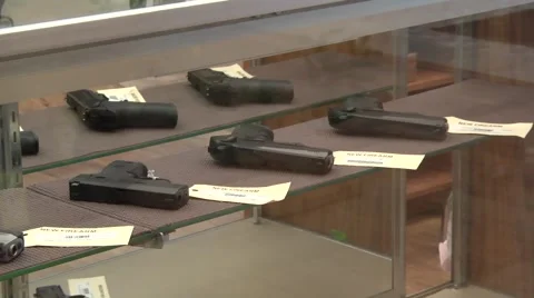 New handguns in showcase Stock Footage 62841713