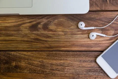 New high technology items on aged wooden desk Stock Photos