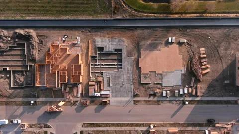 New home construction drone flying over building site Video stock 166536776