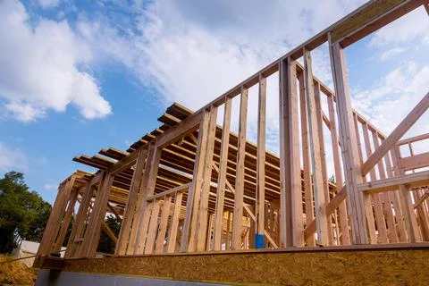 New home construction framing of a house under construction Stock Photos