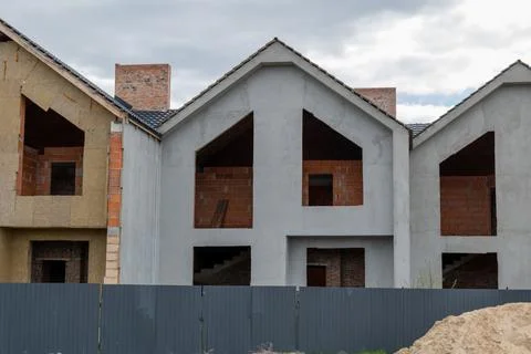 New homes are taking shape in a developing area, with unique architectural .. 写真素材