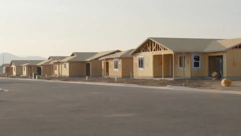 New Homes Construction in Framing Stage in Subdivision Stock-Footage 140484843