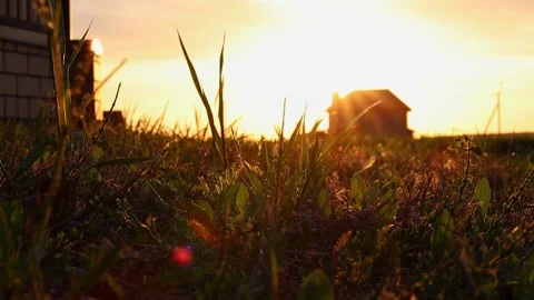 New house in the rays of the setting sun in the background. Selective focus Video stock 154408272