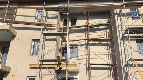 A new house under construction and building materials Stock Footage 106307197