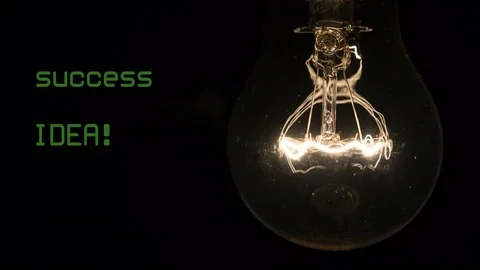 New idea collapses, fail concept. Light bulb burns out on black background Video stock 82896371