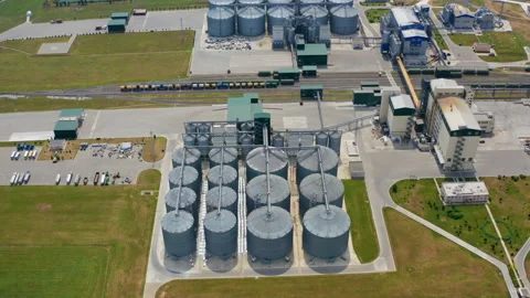 New industrial complex with grain silos. Grain storage tanks in the countryside. Video stock 158832159