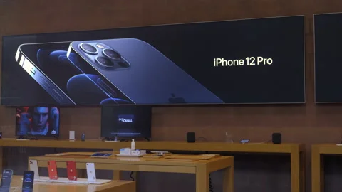 New iPhone 12 and iPhone 12 Pro on display during launch day Stock Footage 141772990