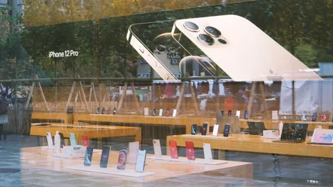 New iPhone 12 and iPhone 12 Pro on display during launch day Stock Footage 141773120