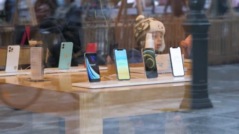 New iPhone 12 and iPhone 12 Pro on display during launch day Stock Footage 141773136