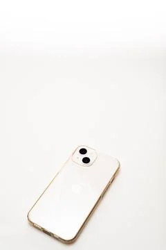 New iPhone 13 smartphone on isolated white background. Apple inc. Stock Photos