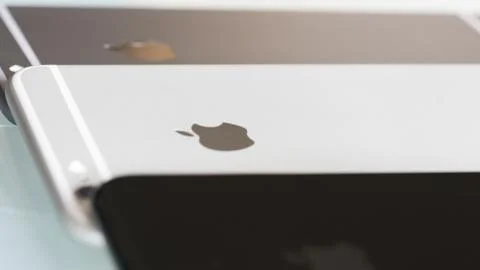 New iPhone 7 plus jet black compared with older.. Stock Photos