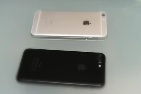  New iPhone 7 plus jet black compared with older.. Stock Photos