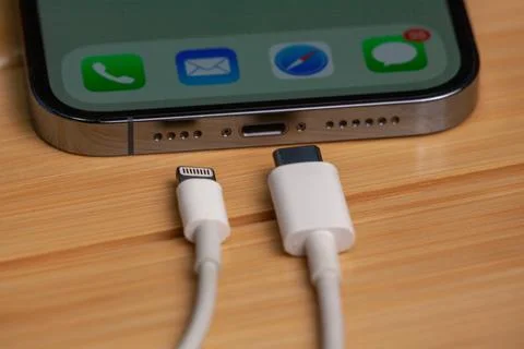 The new iPhone has a new type-c model charger that no longer needs the old model Stock Photos