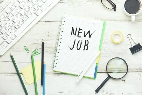New job text on notepad Stock Photos