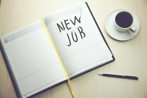 New job text on notepad Stock Photos
