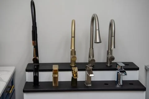 New kitchen taps Stock Photos