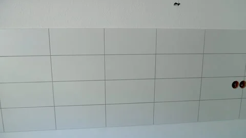 New kitchen tiles - construction site, panning shot Видео 242618250