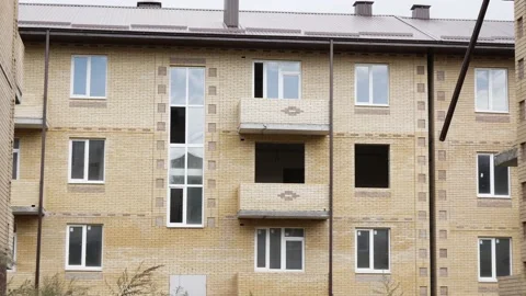 New low-quality multi-storey unfinished building. Stavropol, Russia, 01.09.2020 Stock Footage 144219665