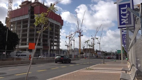 New mall and light train construction sites in Petach Tikva Jabotinsky St. Stock Footage 100885414