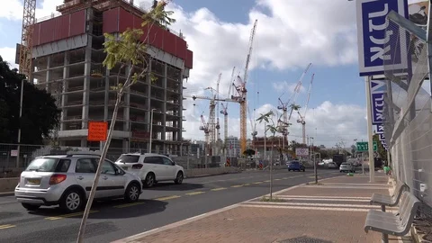 New mall and light train construction sites in Petach Tikva Jabotinsky St. Stock Footage 100974441