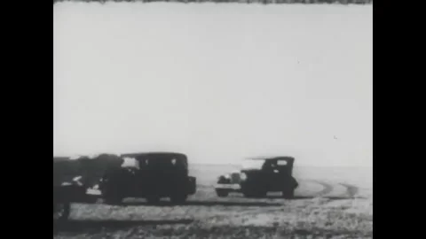 NEW MEXICO - 1930 - Robert Goddard prepares a rocket launch in the New Mexico Stock Footage 340649243